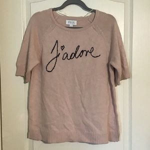 Light pink sweater with j’adore script